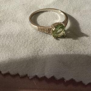 Elegant Silver Ring with Light BlueGemstone